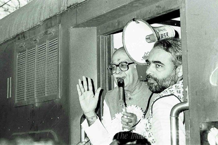 L K Advani and Narendra Modi after the Riots of 92 in Surat. (Express archive photo)